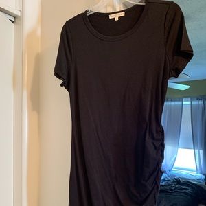 Black mini dress. T-shirt material. Never worn.
